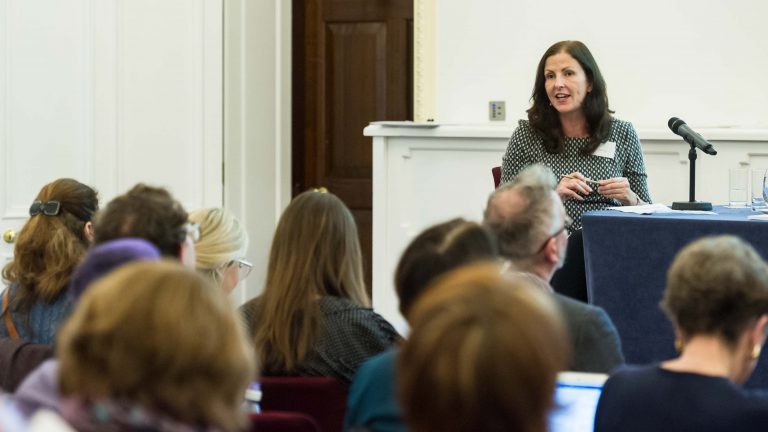Prof Debbie Foster speaks to an audience at a conference